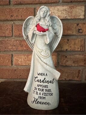 Angel Statue with Red Cardinal.